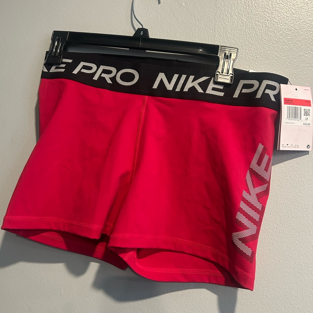 Nike Pro Women's Bright Pink Bike Shorts with Branded Waistband